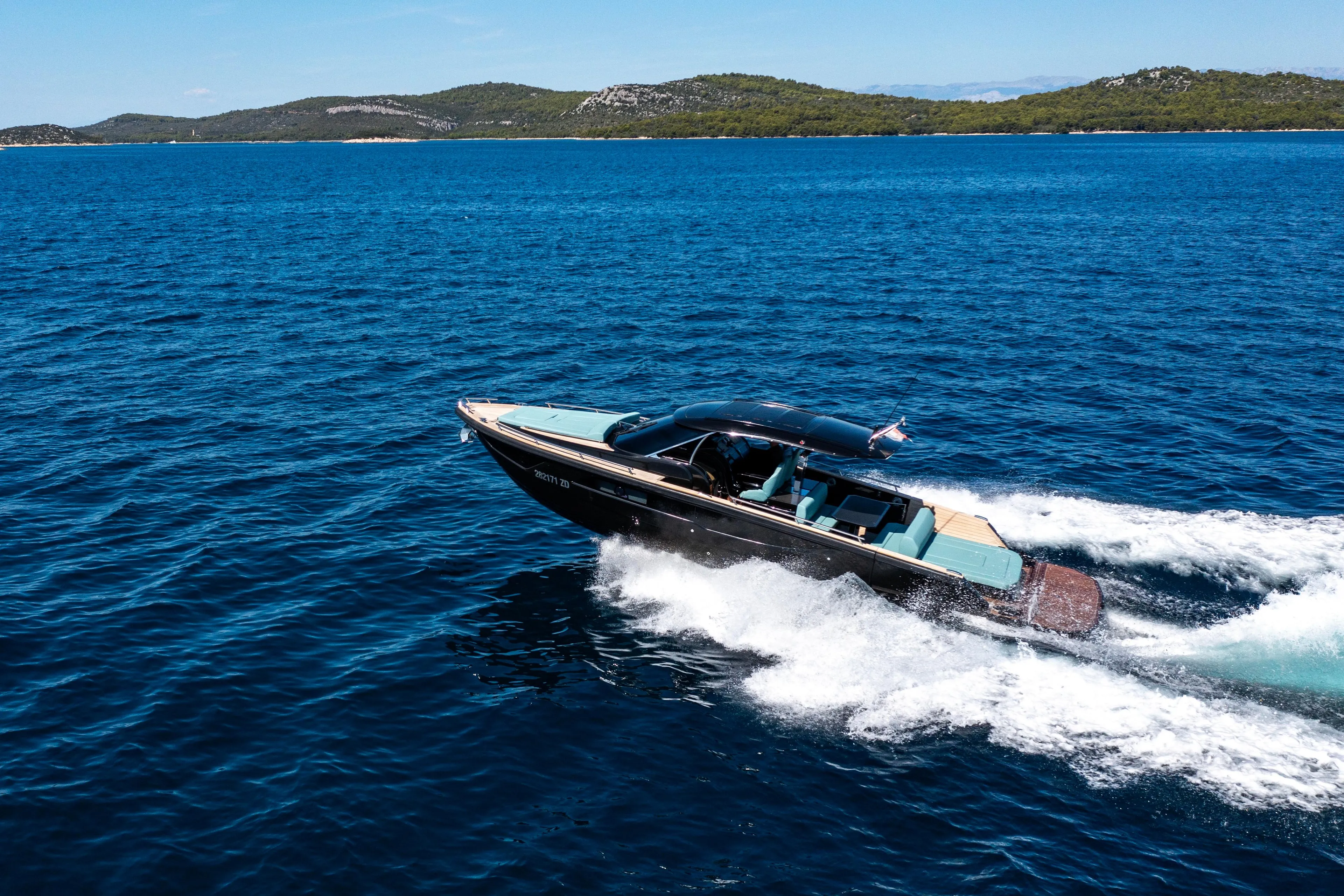 2023 Focus Forza 37 speedboat cruising on blue ocean waters.