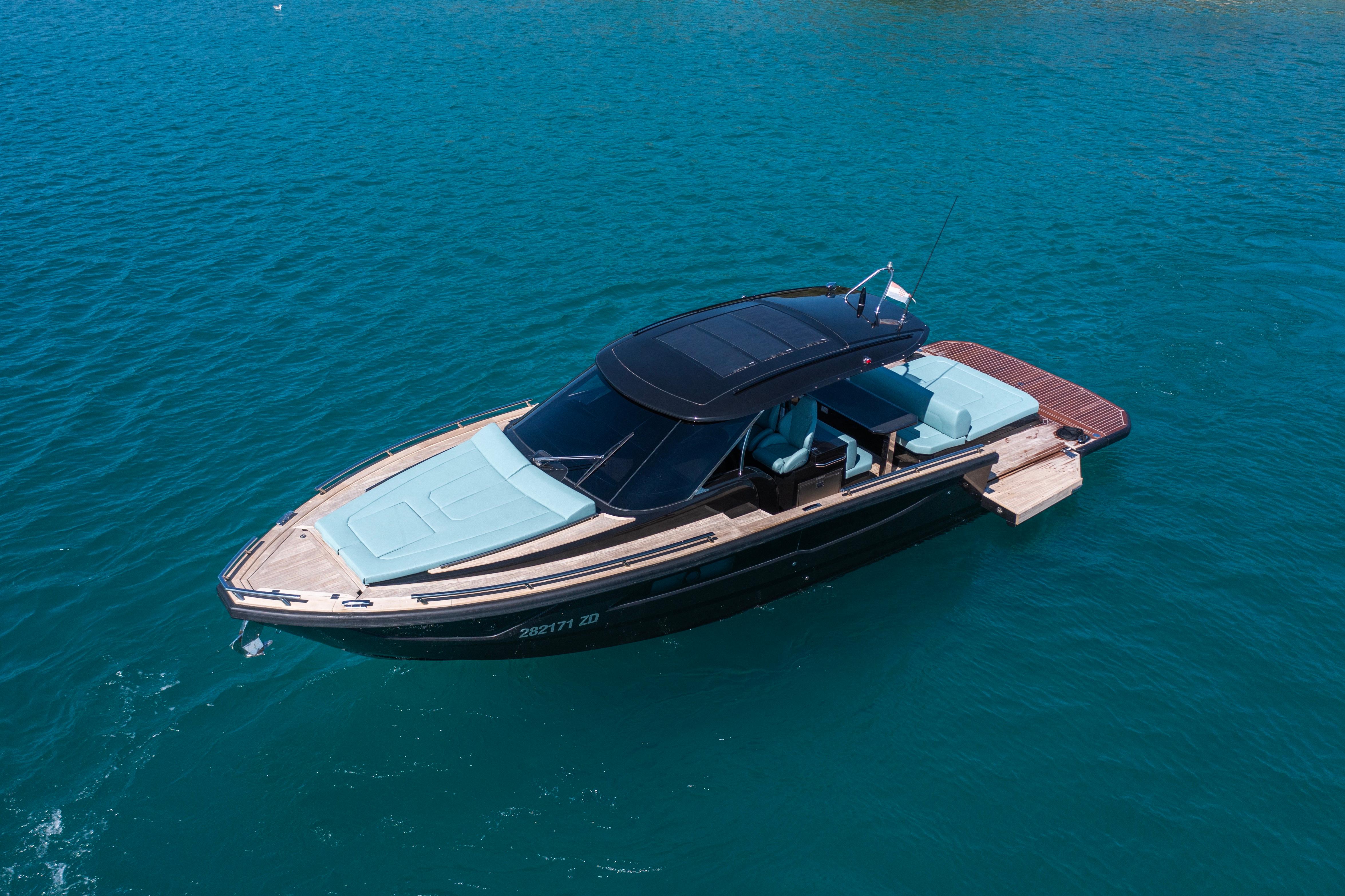 2023 Focus Forza 37 luxury yacht cruising on clear blue water.