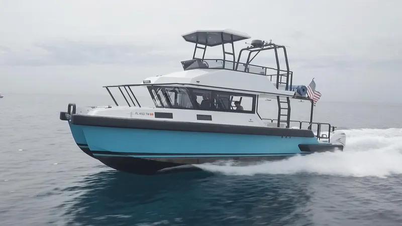  Yacht Photos Pics 2023 Custom Vandal Explorer 46 boat cruising on open water.