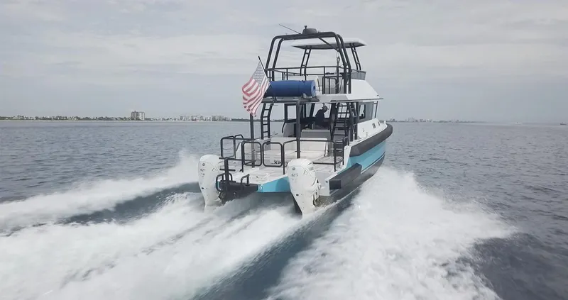  Yacht Photos Pics Custom Vandal Explorer 46 yacht cruising on open water, 2023 model.