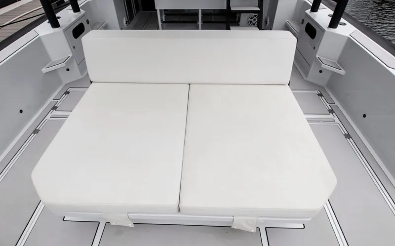  Yacht Photos Pics White cushioned seating on 2023 Custom Vandal Explorer 46 boat deck.