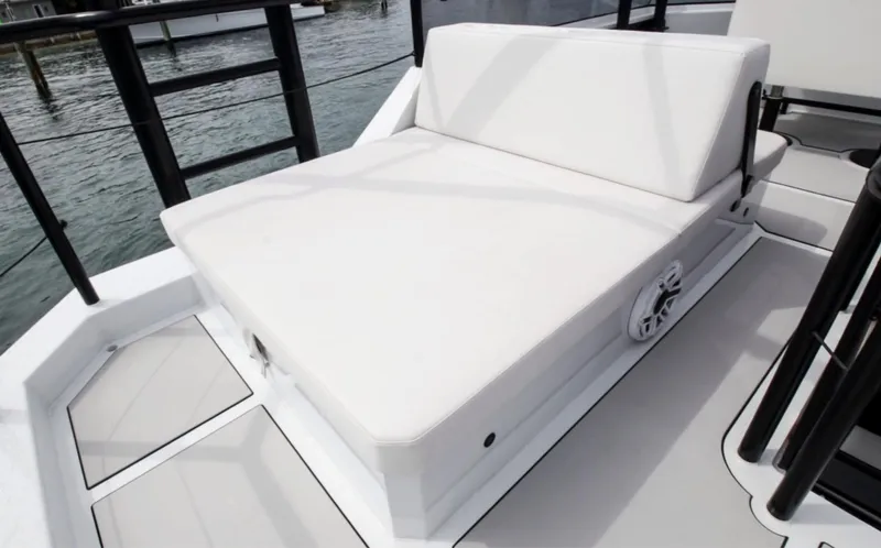  Yacht Photos Pics Luxurious seating on 2023 Custom Vandal Explorer 46 yacht, featuring sleek white cushions.