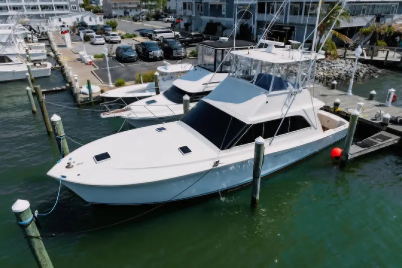  Yacht Photos Pics 1988 Ocean Yachts 48 Super Sport docked at marina, aerial view.