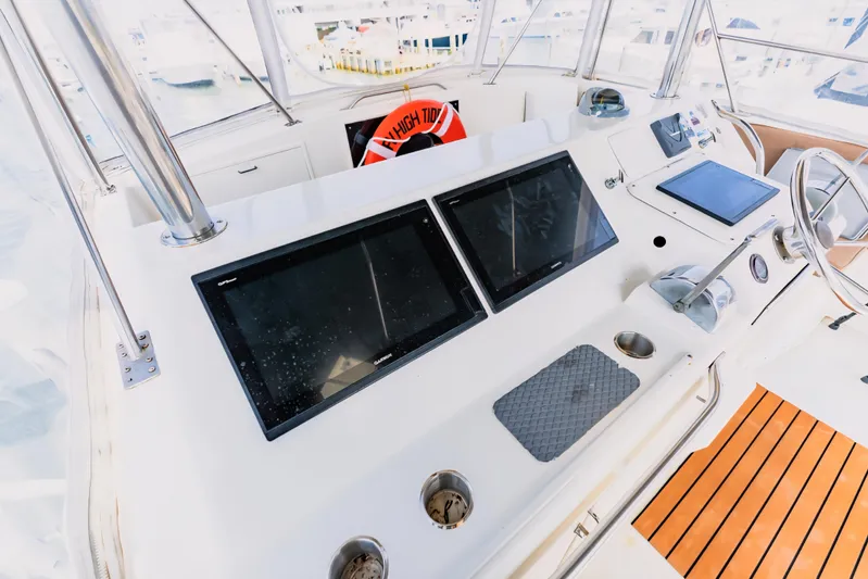  Yacht Photos Pics 1988 Ocean Yachts 48 Super Sport helm with dual screens and steering wheel.