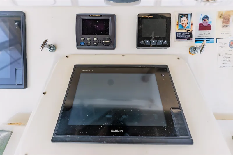  Yacht Photos Pics Control panel of 1988 Ocean Yachts 48 Super Sport with Garmin and Furuno displays.