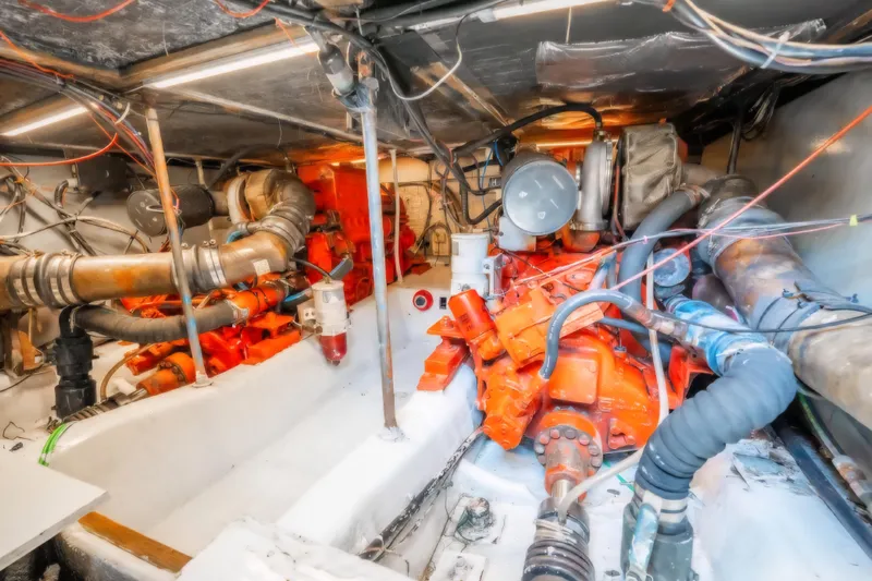  Yacht Photos Pics Engine room of 1988 Ocean Yachts 48 Super Sport with visible machinery and wiring.