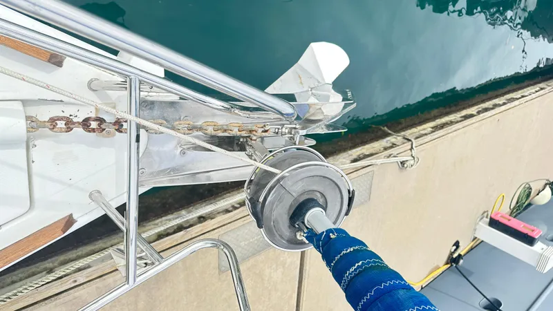  Yacht Photos Pics Bow of 2010 Beneteau Oceanis 50 sailboat with anchor and chain at dock.