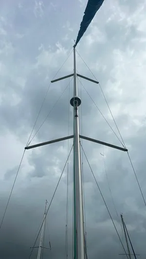  Yacht Photos Pics Mast of 2010 Beneteau Oceanis 50 sailboat against cloudy sky.