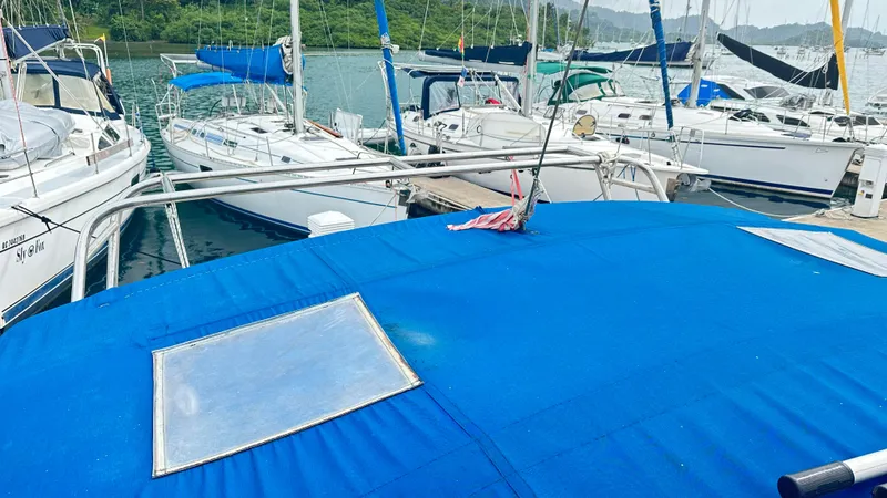  Yacht Photos Pics Docked sailboats including a 2010 Beneteau Oceanis 50 with blue covers.