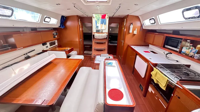  Yacht Photos Pics Interior of 2010 Beneteau Oceanis 50 yacht, featuring a spacious kitchen and dining area.