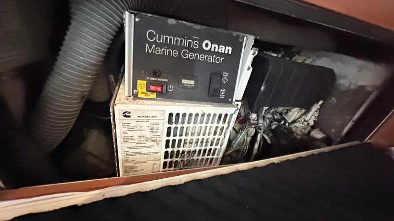  Yacht Photos Pics Cummins Onan marine generator in a 2010 Beneteau Oceanis 50 yacht engine compartment.