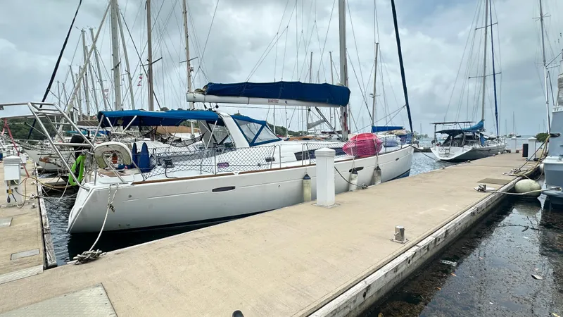  Yacht Photos Pics Sailboat Beneteau Oceanis 50, 2010 model, docked at marina with other yachts.