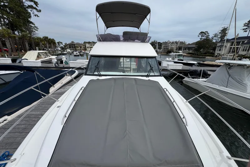  Yacht Photos Pics 2014 Prestige 400 yacht docked at marina, featuring sleek design and spacious deck.