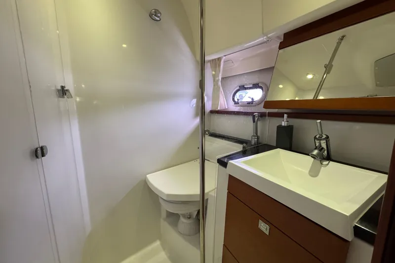  Yacht Photos Pics Bathroom interior of 2014 Prestige 400 yacht with modern fixtures.