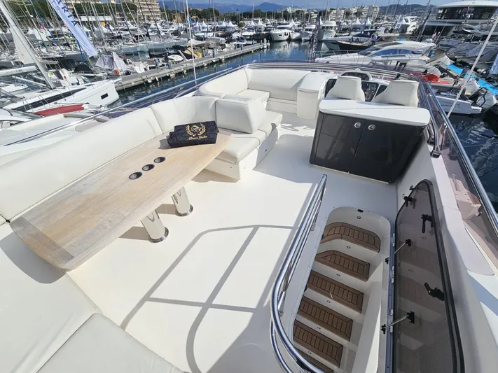  Yacht Photos Pics Luxurious 2013 Princess 52 Flybridge yacht with spacious seating and elegant design at marina.