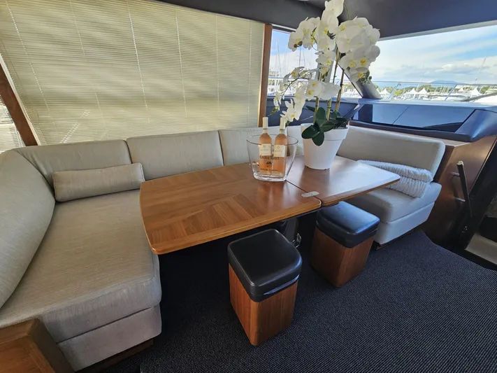  Yacht Photos Pics Luxurious interior of 2013 Princess 52 Flybridge yacht with elegant seating and decor.