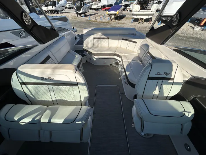  Yacht Photos Pics Luxurious interior of a 2018 Sea Ray SLX 280 boat with elegant seating.