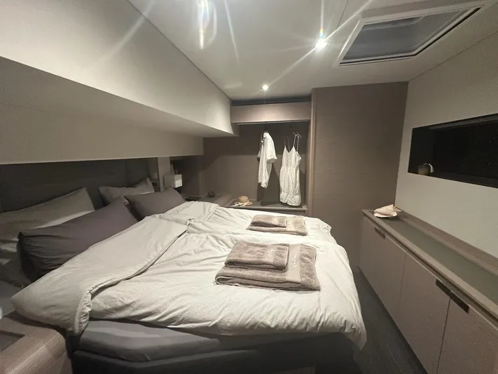  Yacht Photos Pics Luxurious bedroom interior of 2020 Fountaine Pajot Samana 59 yacht with modern design.