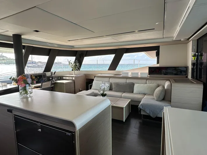  Yacht Photos Pics Luxurious interior of 2020 Fountaine Pajot Samana 59 yacht with modern furnishings and ocean view.