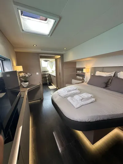  Yacht Photos Pics Luxurious bedroom interior of 2020 Fountaine Pajot Samana 59 yacht with modern design.