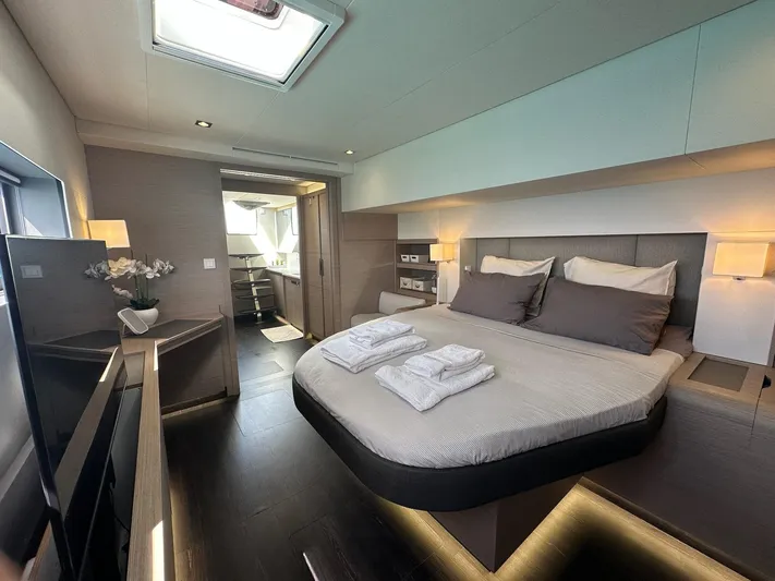  Yacht Photos Pics Luxurious bedroom interior of 2020 Fountaine Pajot Samana 59 yacht, featuring modern design.