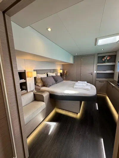  Yacht Photos Pics Luxurious cabin interior of 2020 Fountaine Pajot Samana 59 yacht with modern furnishings.
