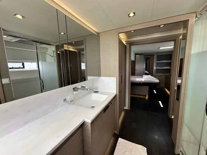  Yacht Photos Pics Luxurious bathroom interior of 2020 Fountaine Pajot Samana 59 yacht with modern fixtures.