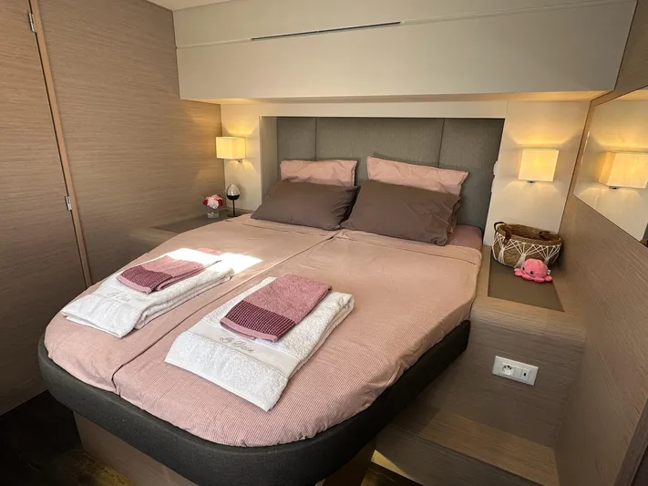  Yacht Photos Pics Luxurious bedroom interior of 2020 Fountaine Pajot Samana 59 yacht with cozy bedding.