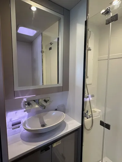  Yacht Photos Pics Modern bathroom in 2020 Fountaine Pajot Samana 59 yacht with sleek fixtures and glass shower.