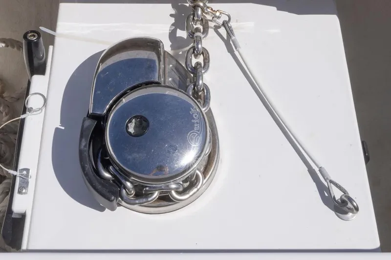  Yacht Photos Pics Anchor winch on 2023 Invincible 37 Catamaran deck, featuring stainless steel components.