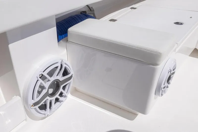  Yacht Photos Pics 2023 Invincible 37 Catamaran interior with cushioned seating and marine speakers.