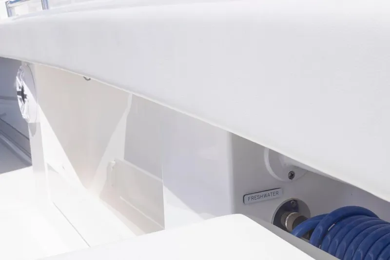  Yacht Photos Pics 2023 Invincible 37 Catamaran freshwater hose compartment detail.