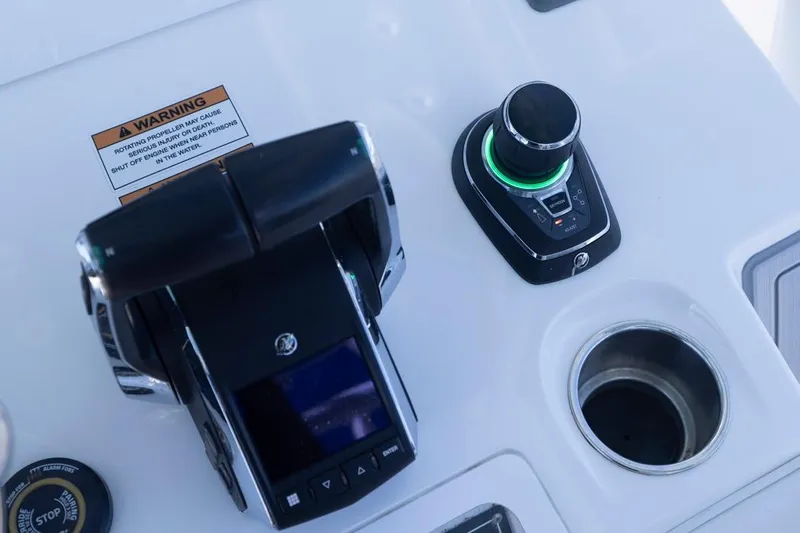  Yacht Photos Pics Control panel of 2023 Invincible 37 Catamaran with throttle and joystick.
