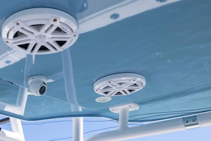  Yacht Photos Pics 2023 Invincible 37 Catamaran with marine speakers and camera on blue ceiling.