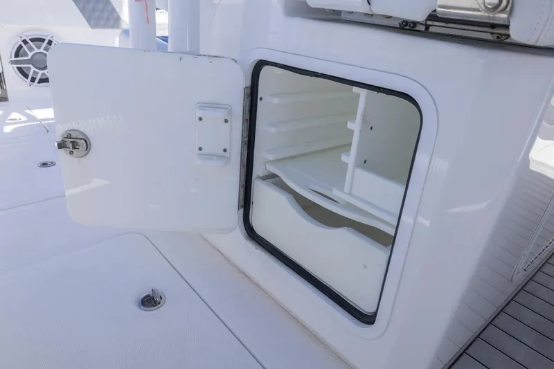 Yacht Photos Pics Open storage compartment on 2023 Invincible 37 Catamaran boat deck.