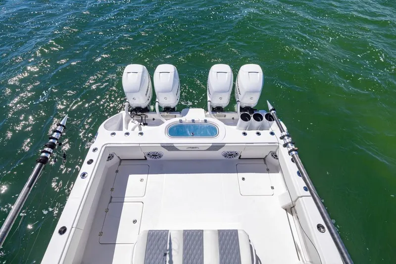  Yacht Photos Pics 2023 Invincible 37 Catamaran with quad engines on open water.