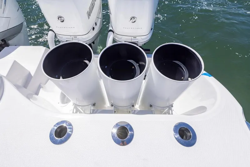  Yacht Photos Pics 2023 Invincible 37 Catamaran with triple outboard engines on water.