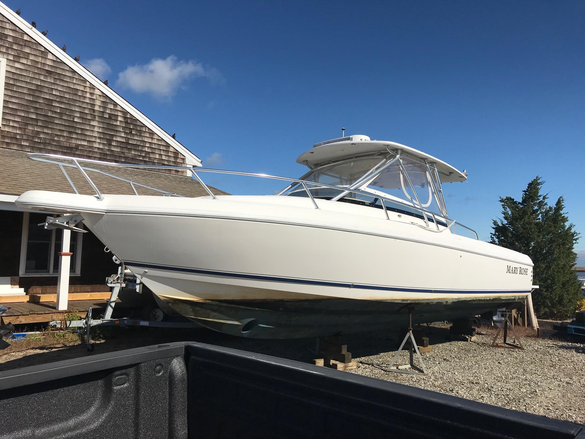 2004 Intrepid 310 Walkaround Cuddy Cabin for sale YachtWorld