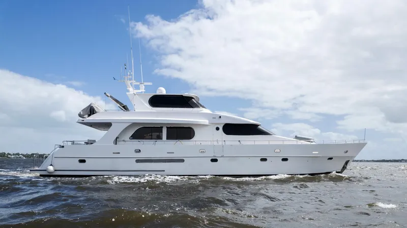 Cinnabar VI Yacht Photos Pics Grand Harbour 76 yacht cruising on open water, 2001 model.