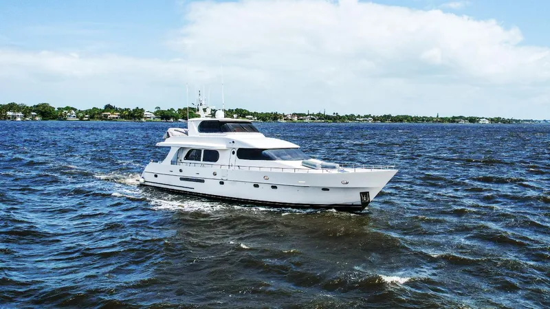 Cinnabar VI Yacht Photos Pics Luxury yacht Grand Harbour 76 cruising on open water, 2001 model.