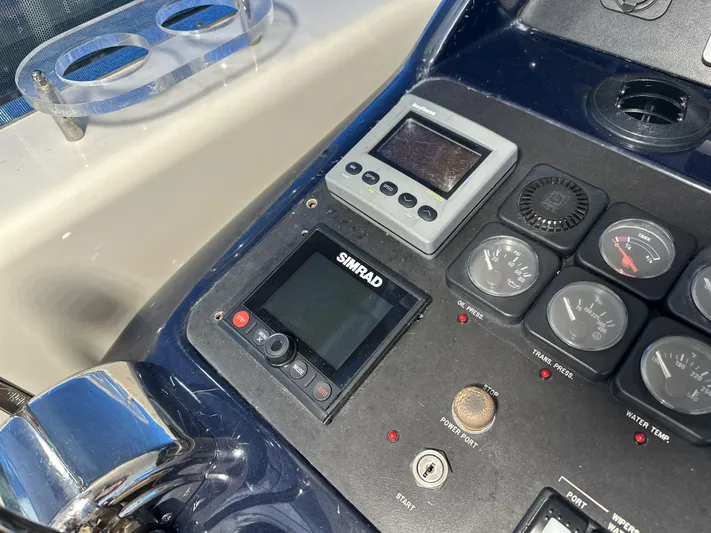  Yacht Photos Pics Control panel of 1999 Uniesse 57 Open yacht with Simrad navigation system.