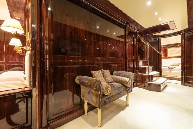 Claudia Berruto Yacht Photos Pics Luxurious interior of 2001 Baglietto M/Y 32 D yacht with elegant wood paneling.