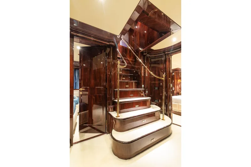 Claudia Berruto Yacht Photos Pics Luxurious wooden staircase on Baglietto M/Y 32 D yacht, 2001 model.