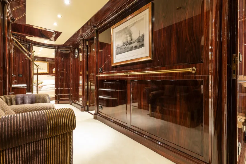 Claudia Berruto Yacht Photos Pics Luxurious interior of 2001 Baglietto M/Y 32 D yacht with polished wood and elegant decor.