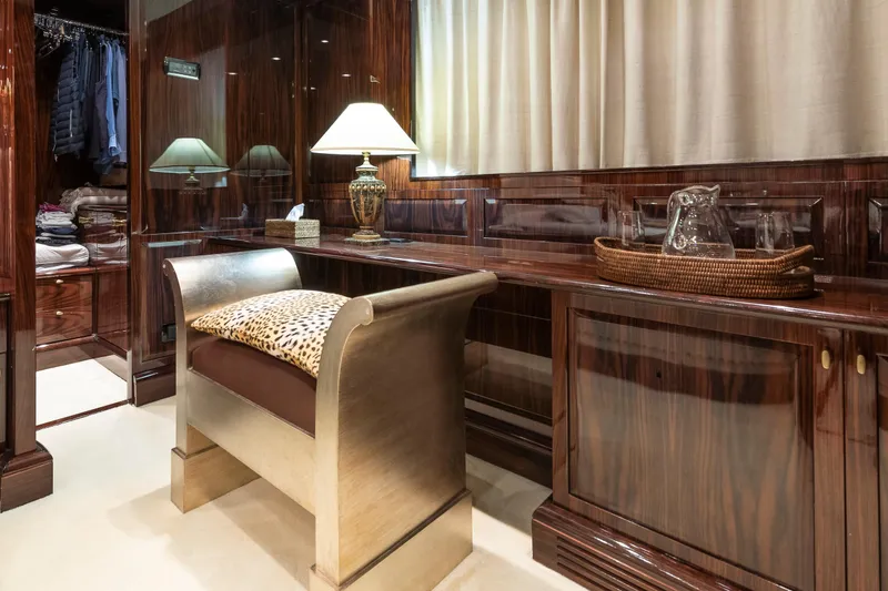 Claudia Berruto Yacht Photos Pics Luxurious interior of 2001 Baglietto M/Y 32 D yacht with elegant wood finishes and decor.