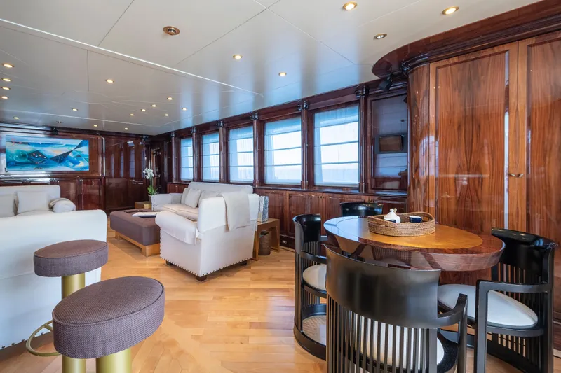 Claudia Berruto Yacht Photos Pics Luxurious interior of 2001 Baglietto M/Y 32 D yacht with elegant wood finishes.