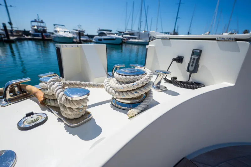  Yacht Photos Pics 2019 Bluegame BG42 yacht deck with ropes and marina view.