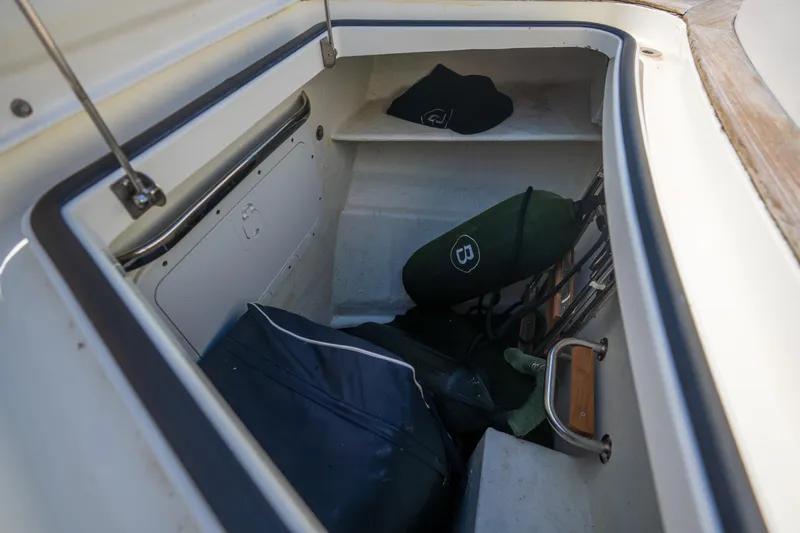  Yacht Photos Pics Storage compartment of 2019 Bluegame BG42 boat with bags and equipment.