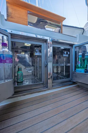  Yacht Photos Pics 2019 Bluegame BG42 yacht with open stainless steel refrigerators on deck.