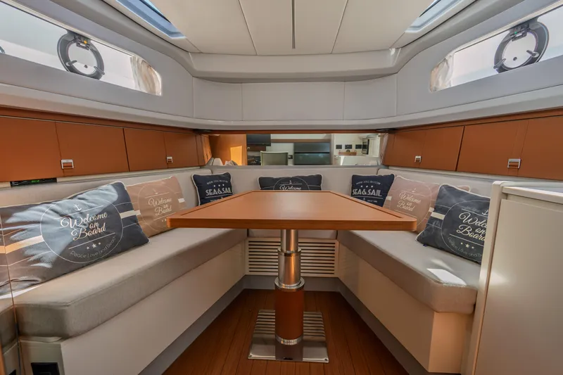  Yacht Photos Pics Luxurious interior of 2019 Bluegame BG42 yacht with cozy seating and elegant design.